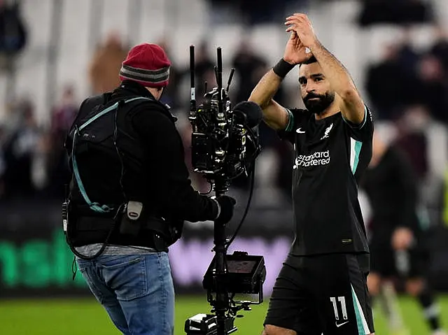 Mohamed Salah applauds the fans after the final whistle