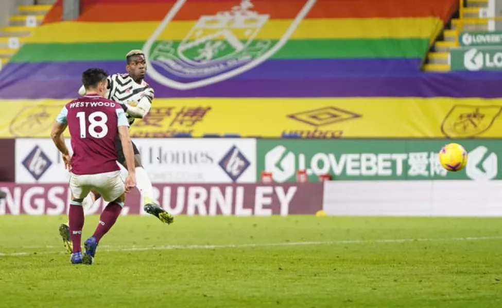 Paul Pogba, right, volleys the winner at Turf Moor