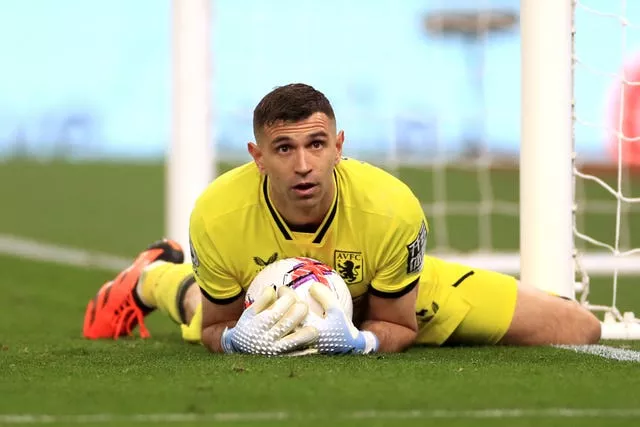 Aston Villa goalkeeper Emiliano Martinez gathers the ball