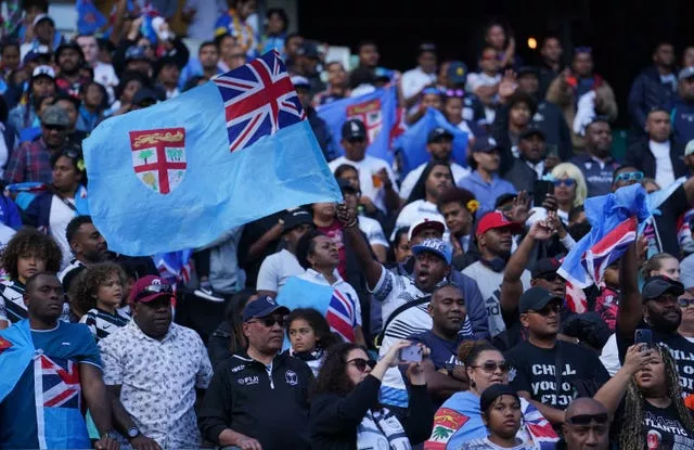 Fiji fans celebrate a famous victory at Twickenham