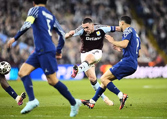John McGinn, centre, scores Aston Villa’s second goal under pressure from Achraf Hakimi