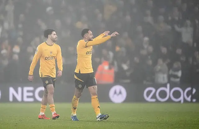 Matheus Cunha (right) celebrates with Rayan Ait-Nouri (left) after opening the scoring