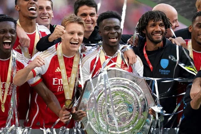 Odegaard has joined the likes of Bukayo Saka (centre) in committing his future to Arsenal