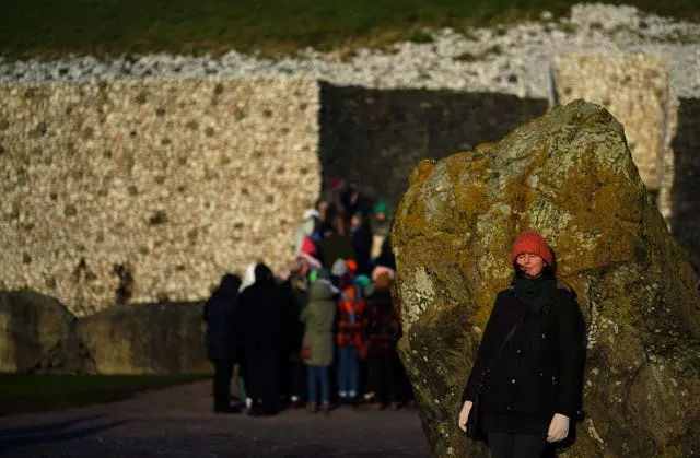 People gather for sunrise at Newgrange on the morning of the winter solstice 