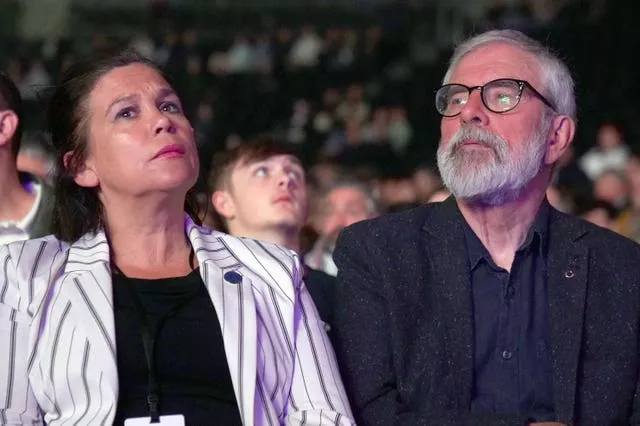 Sinn Fein’s President Mary Lou McDonald sits with former Sinn Fein president Gerry Adams