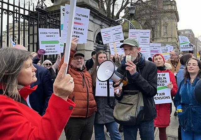 Tutors gathered outside Leinster House in Dublin 