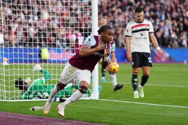 Crysencio Summerville starts to take off his shirt to celebrate scoring his first goal for West Ham