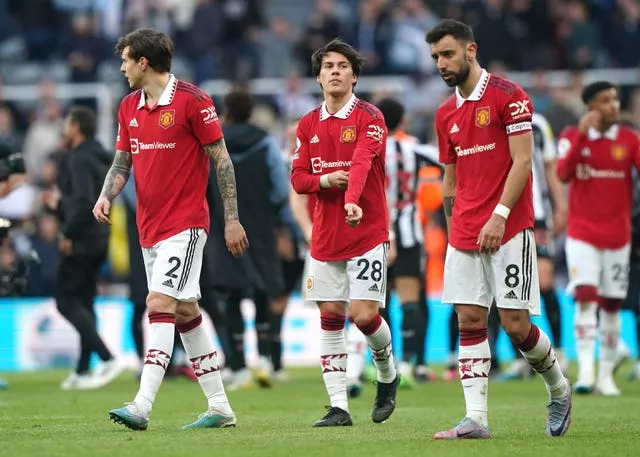 Manchester United’s Victor Lindelof, Facundo Pellistri and Bruno Fernandes look dejected after the final whistle 