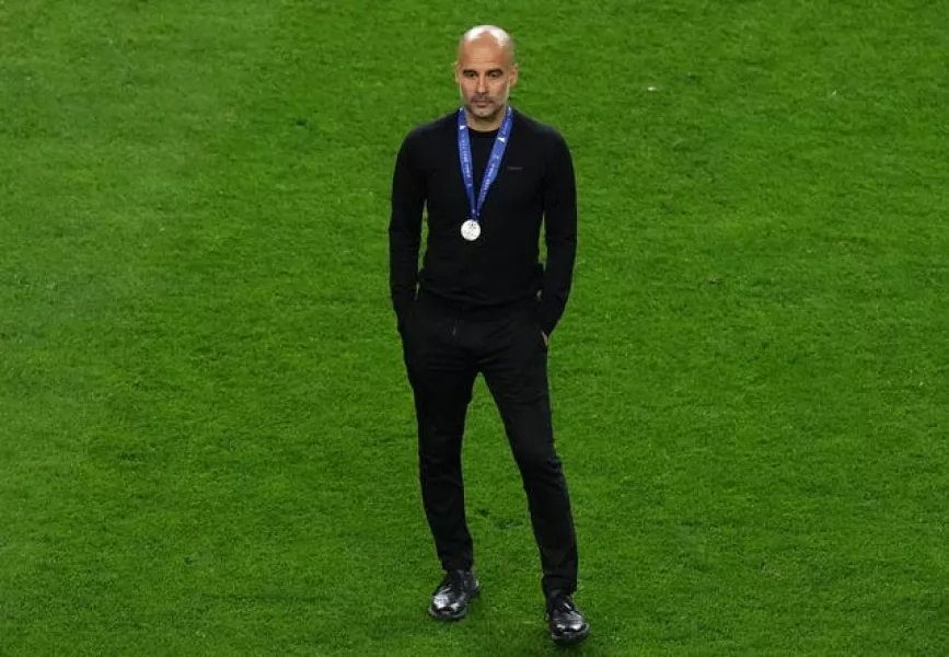 Guardiola looked on as Chelsea celebrated their success 
