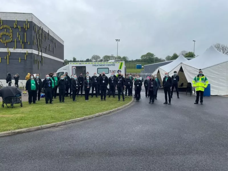 St John Ambulance vaccination volunteers at the ESSA Academy site in Bolton, Greater Manchester (St John Ambulance/AP)