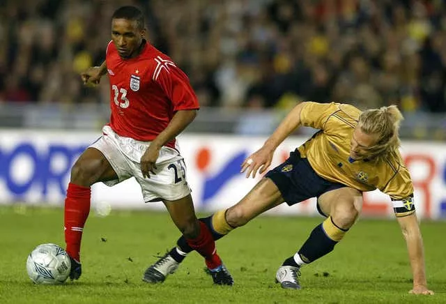Jermain Defoe, left, made his England debut against Sweden in 2004