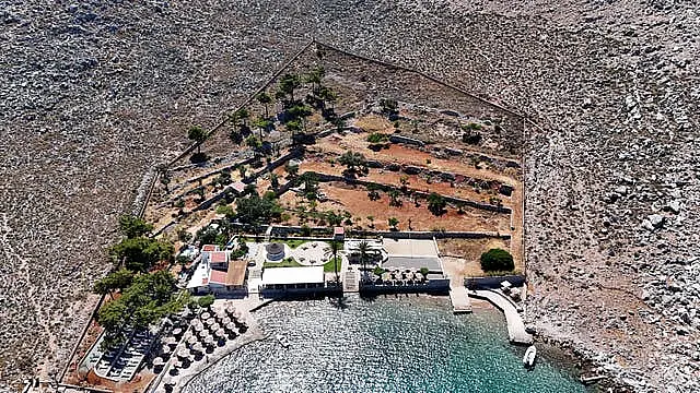 Agia Marina in Symi, Greece, after the body of TV doctor and columnist Michael Mosley was removed from the rocks on the right-hand side of the compound