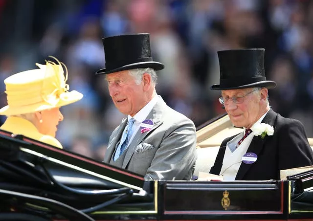 Lord Fellowes with Queen Elizabeth II and Charles in a carriage at Royal Ascot 