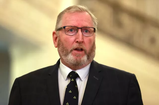 Head and shoulders shot of a man with a beard