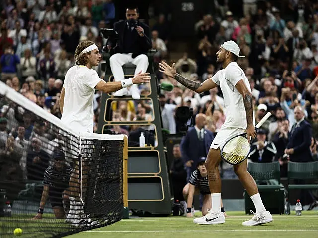 Stefanos Tsitsipas (left) and Nick Kyrgios shake hands