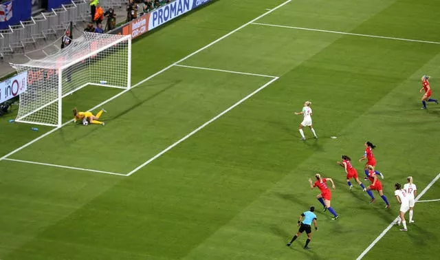 Alyssa Naeher, left, saves Steph Houghton's penalty in the 2019 World Cup smei-final