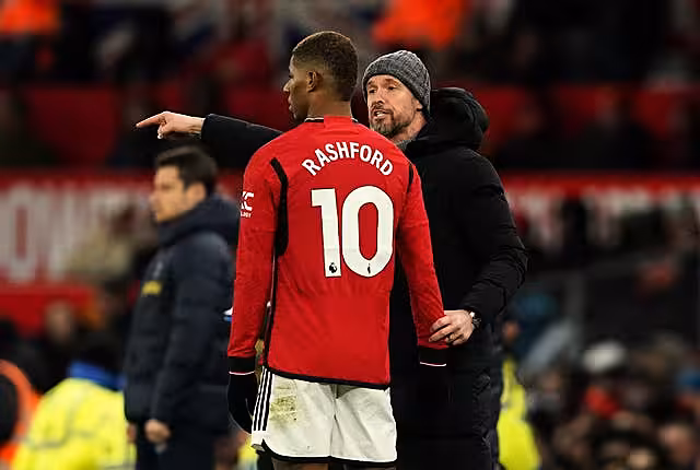 Erik ten Hag speaks to Marcus Rashford during the recent 2-2 draw with Tottenham