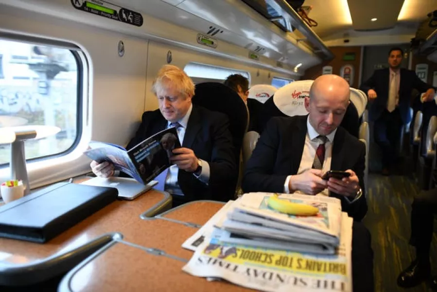 Boris Johnson alongside Lee Cain during last autumn's general election campaign