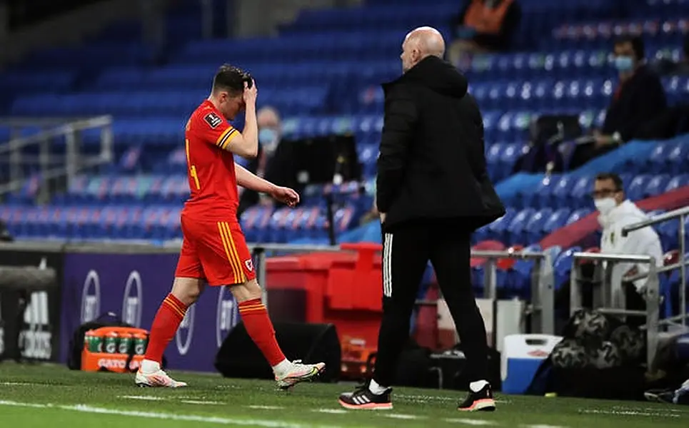 Connor Roberts leaves the field after his red card