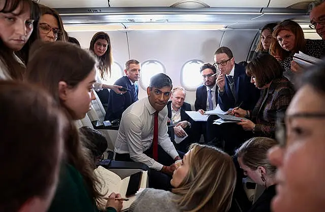 Rishi Sunak on a plane