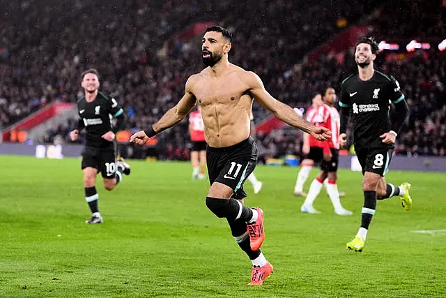 Mohamed Salah takes off his shirt in celebration