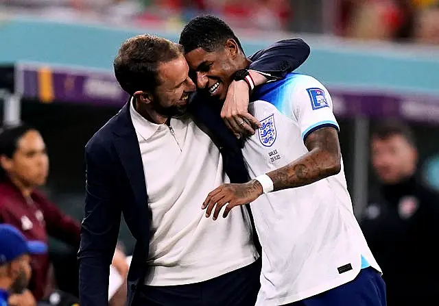 Gareth Southgate hugs Marcus Rashford