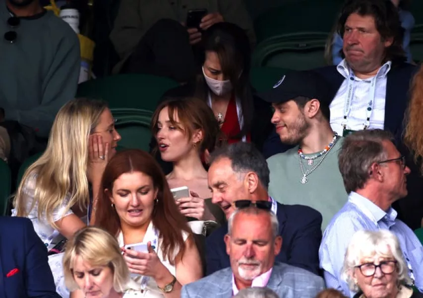 Phoebe Dynevor (centre) and Pete Davidson (right)