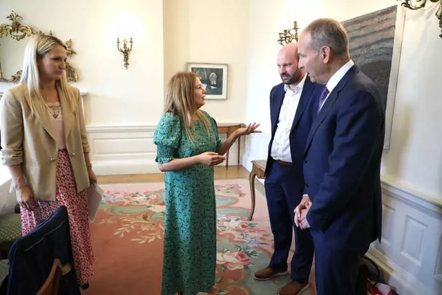 Cat Gallagher-Wilkinson, centre, (meeting with Tanaiste Micheal Martin, right, and justice minister Helen McEntee, left, at Iveagh House