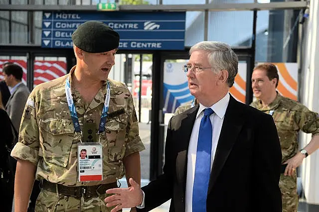 Marcus Reedman with then defence secretary Michael Fallon in 2014