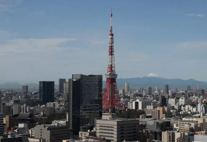 The Tokyo Tower with Mount Fuji in the distance (David Davies/PA)