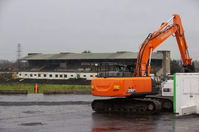 Orange digger outside Casement Park GAA stadium