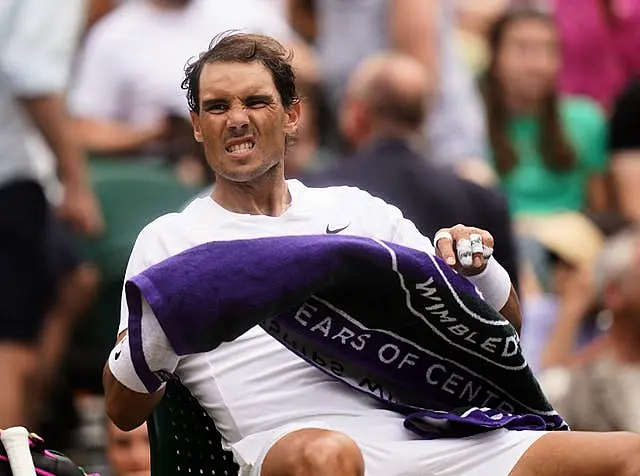 Rafael Nadal grimaces as he battles injury