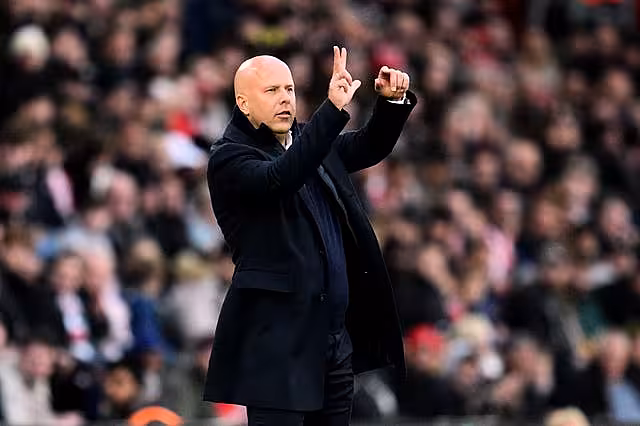 Arne Slot signals instructions to his Liverpool team from the touchline
