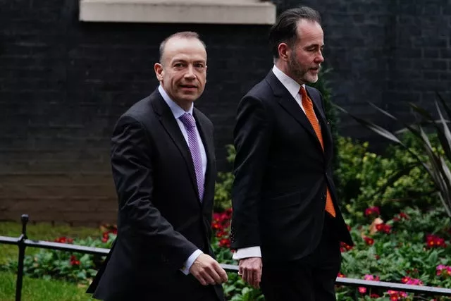 Chris Pincher (right) leaves Downing Street with chief whip Chris Heaton-Harris following their appointment in February