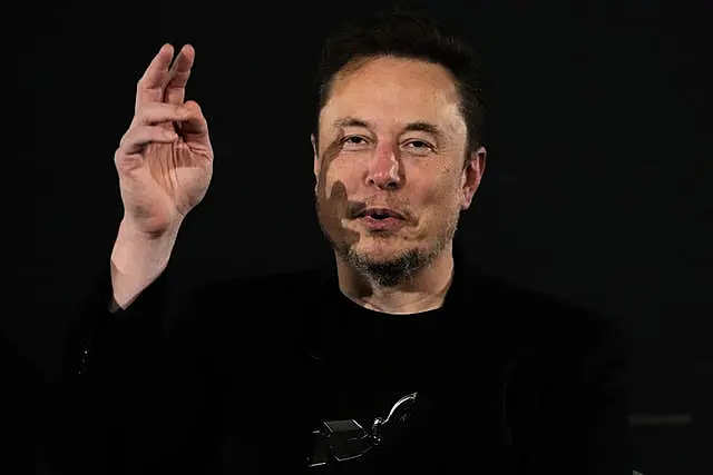 Elon Musk, CEO of Tesla and SpaceX gestures during an ‘in-conversation’ event with Prime Minister Rishi Sunak in central London, at the conclusion of the second day of the AI Safety Summit on the safe use of artificial intelligence