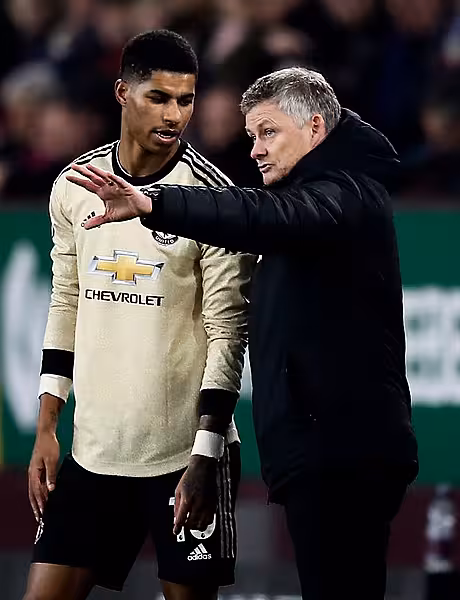 Solskjaer (right) says Rashford has his full support after recently being subjected to racial abuse