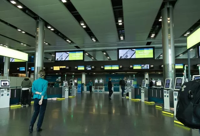 An empty Aer Lingus check-in desk area at Dublin Airport