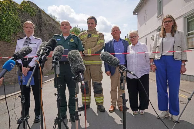 From left, Metropolitan Police Detective Chief Superintendent Clair Kelland, Chief Paramedic Dr John Martin from the London Ambulance Service, Andrew Pennick, London Fire Brigade and school governor John Tucker, speak to the media 