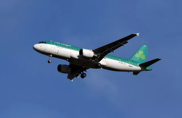 A Aer Lingus Airbus A320-214 plane lands at Heathrow