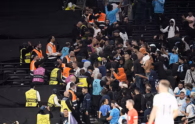 Fans clashed at full-time and five arrests were made