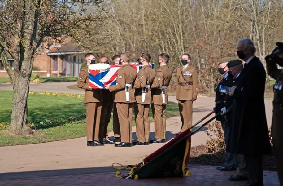 The coffin of Captain Sir Tom Moore was carried by members of the Armed Forces