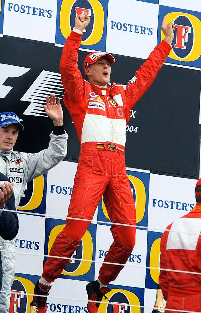 Ferrari’s Michael Schumacher celebrates after winning the British Grand Prix (Rui Vieira/PA)