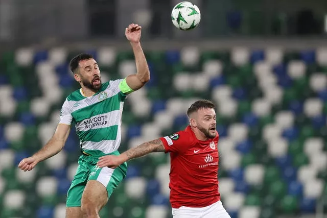 Shamrock Rovers’ Roberto Lopes (left) and Larne’s Andy Ryan battle for the ball