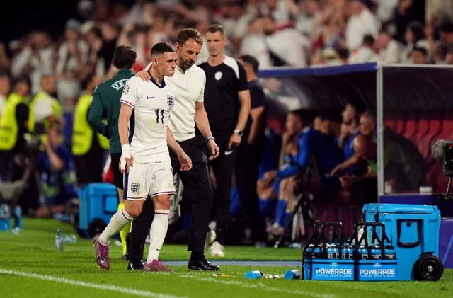 England manager Gareth Southgate and Phil Foden during the Euro 2024 group game against Slovenia