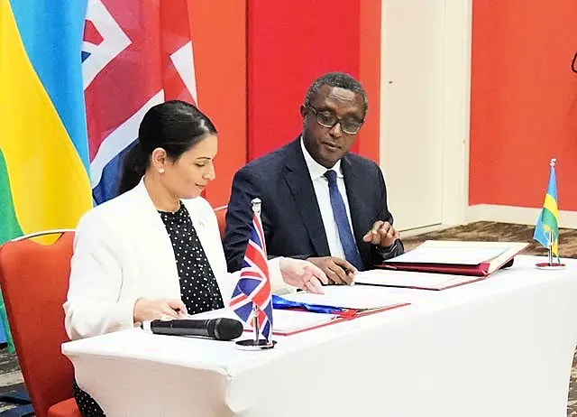 Home Secretary Priti Patel and Rwandan minister for foreign affairs and international co-operation, Vincent Biruta, sign a migration and economic development partnership 