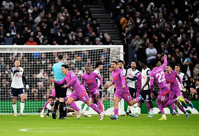 Hwang Hee-Chan (second left) celebrates scoring their side’s first goal