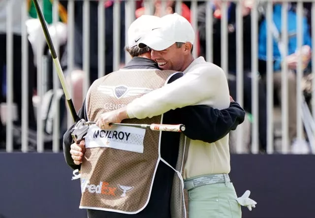 Rory McIlroy hugs caddie Harry Diamond
