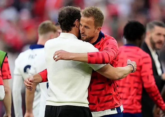 England manager Gareth Southgate celebrates with Harry Kane