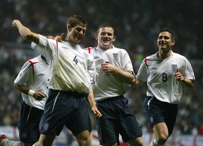 Steven Gerrard, Wayne Rooney and Frank Lampard, l-r, celebrate a Gerrard goal for England