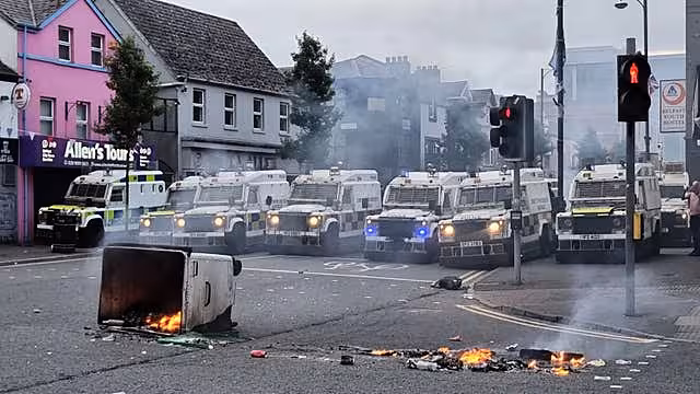 PSNI officers man road blocks in Belfast on Saturday night